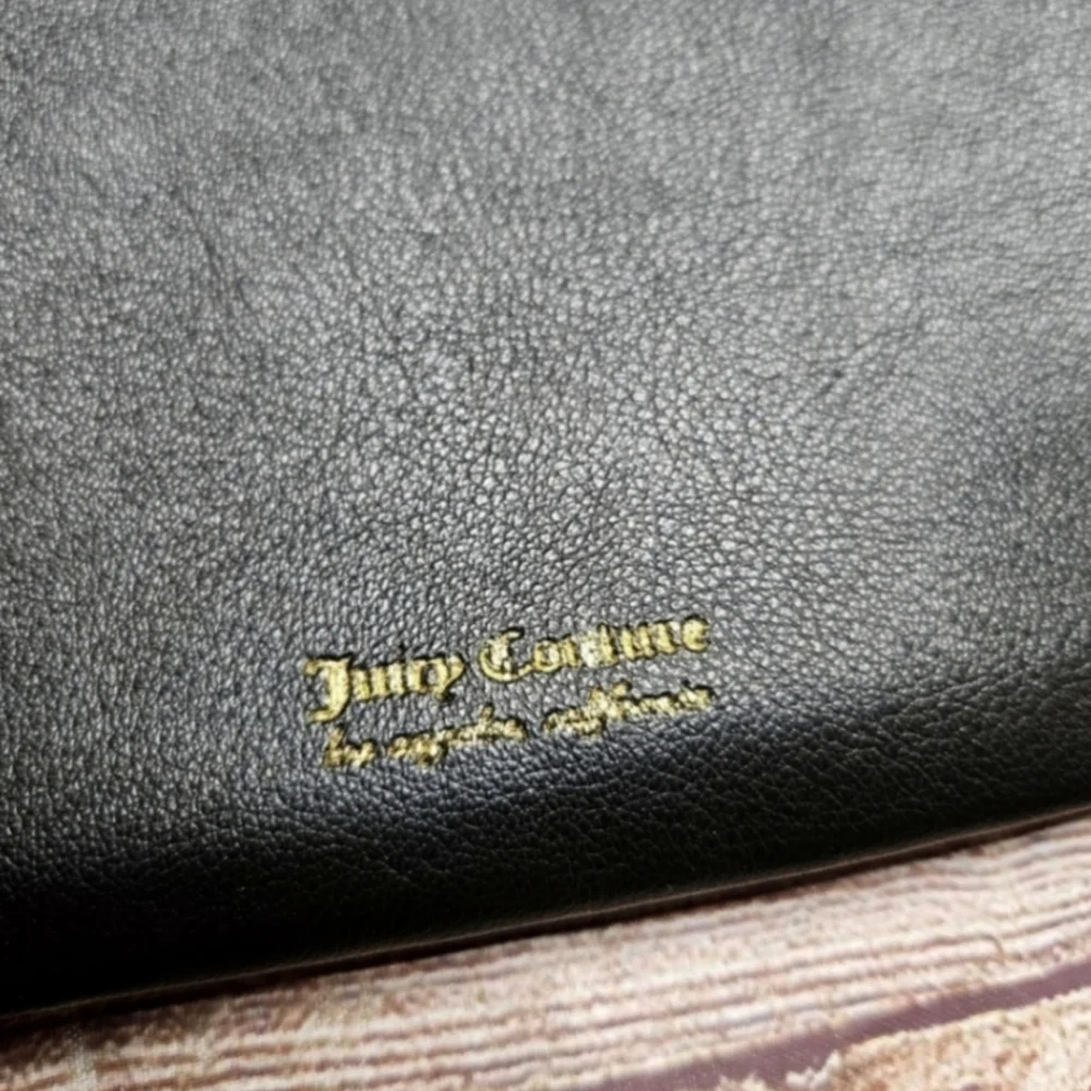 Juicy Couture black faux leather cosmetic clutch bag